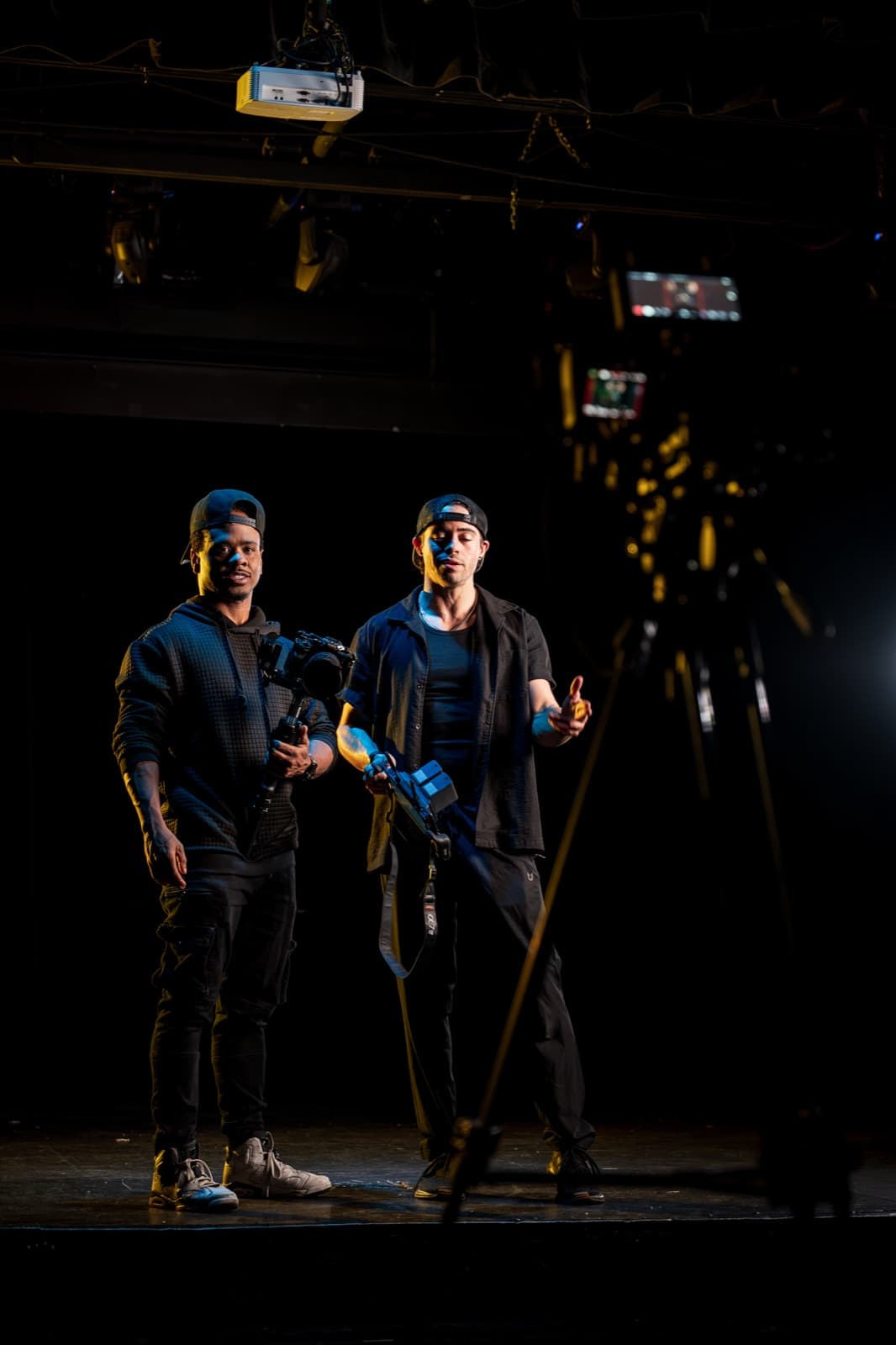 MediaGeekz event production crew on a dramatic stage set