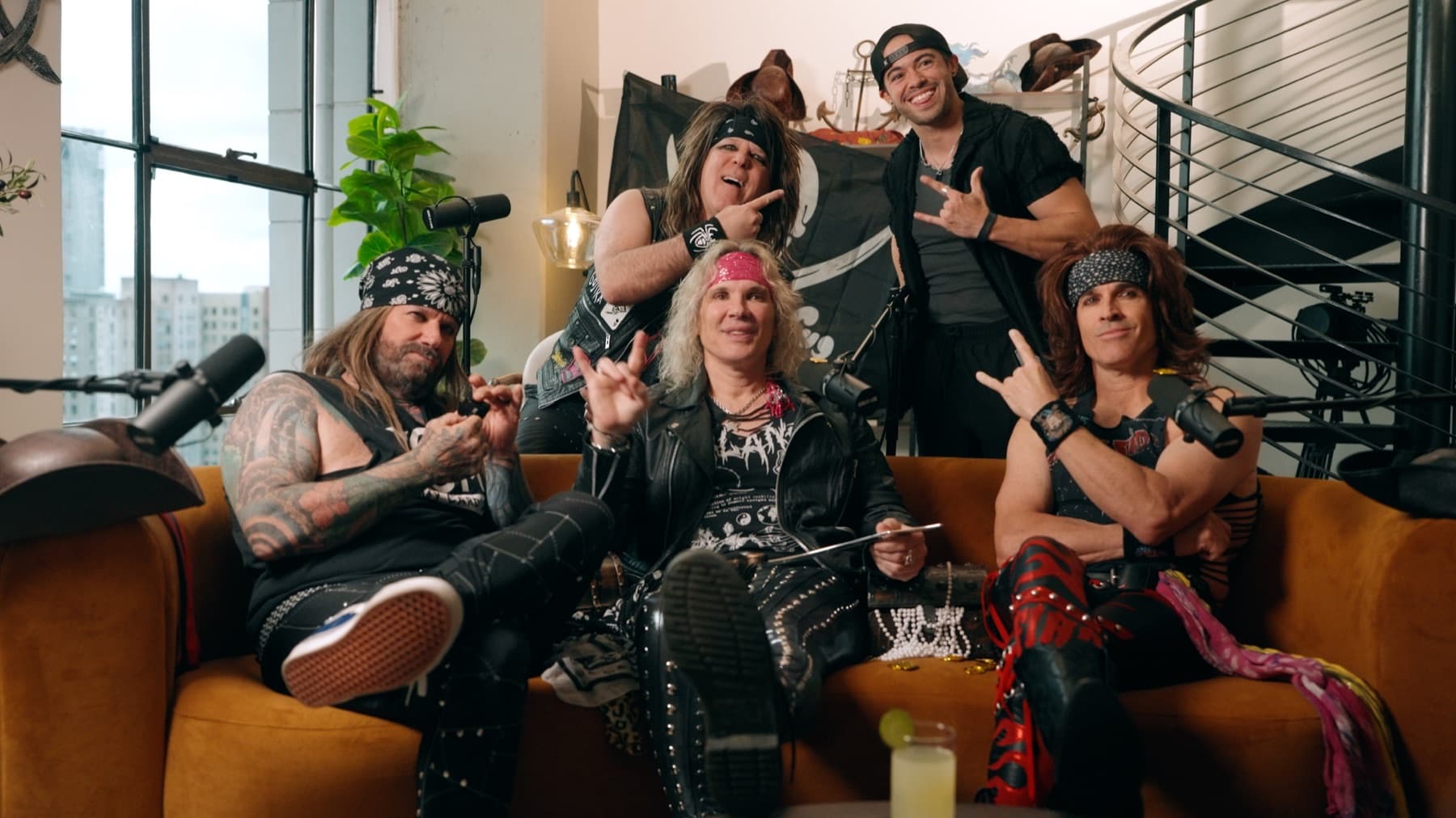 Steel Panther with the MediaGeekz production team during a podcast-style shoot
