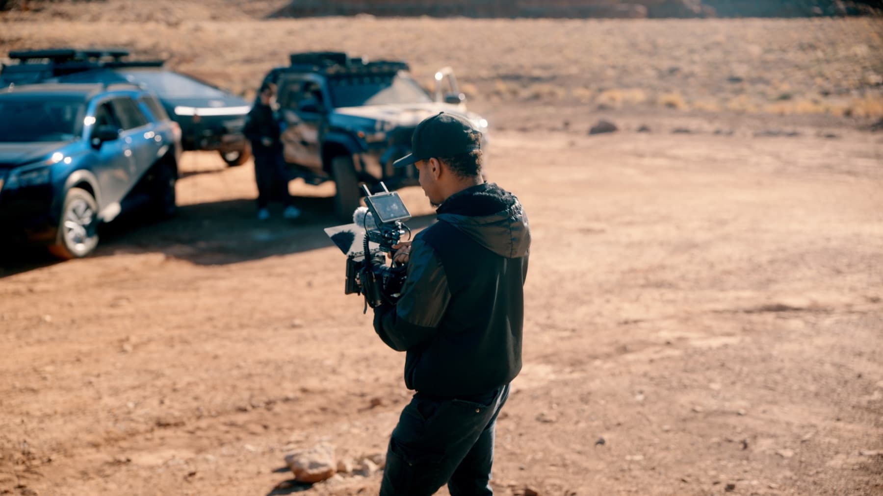 A MediaGeekz camera operator filming an off-road vehicle campaign in Moab