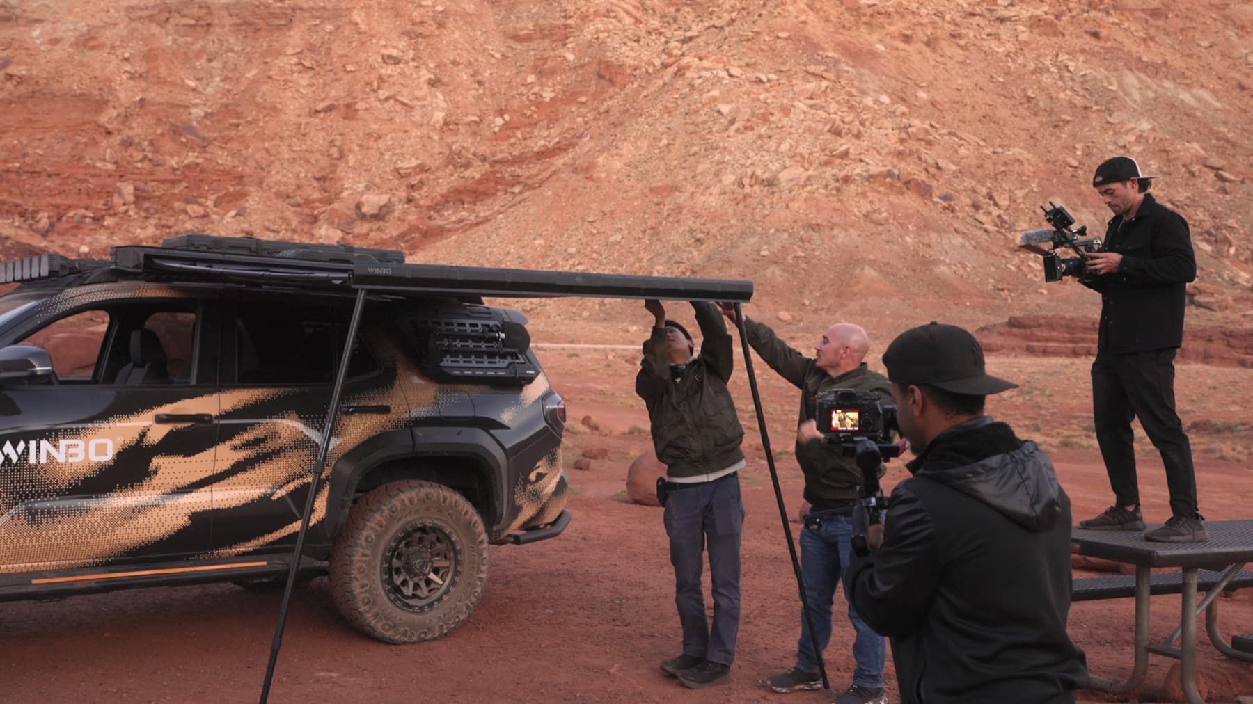 MediaGeekz crew rigging a WINBO vehicle for a commercial shoot in Moab